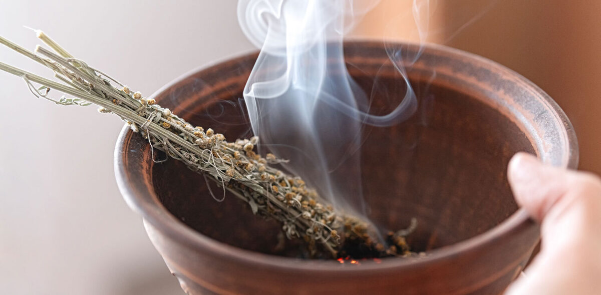 Burning mugwort incense ritual